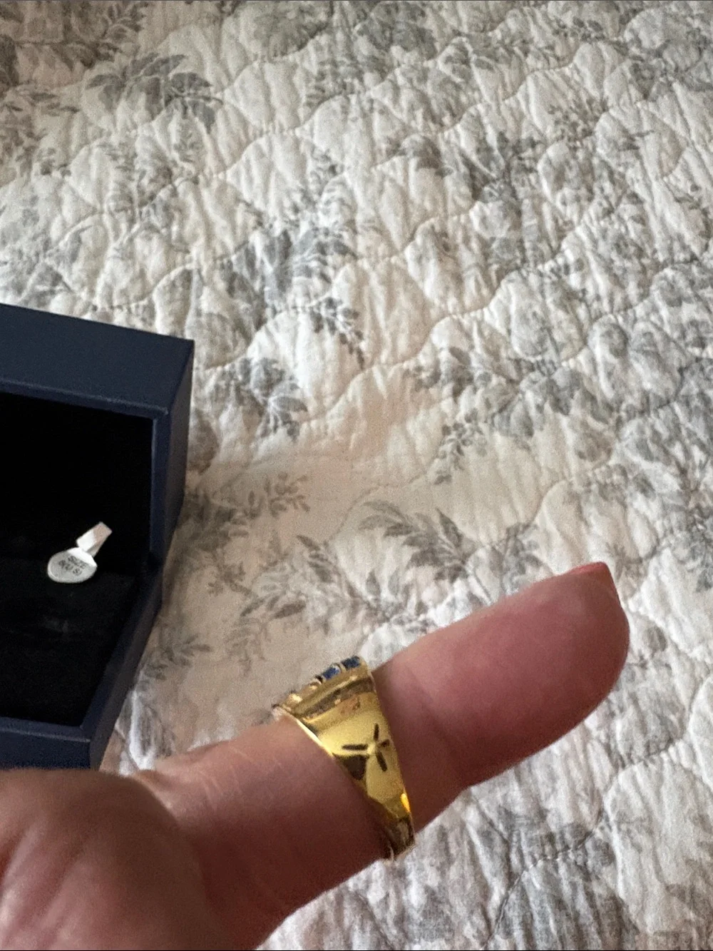 Gold-tone Wave Ring with Blue and Clear Stones